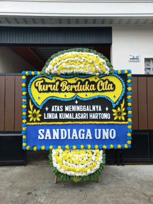 Papan Bunga Duka di Tiomneri